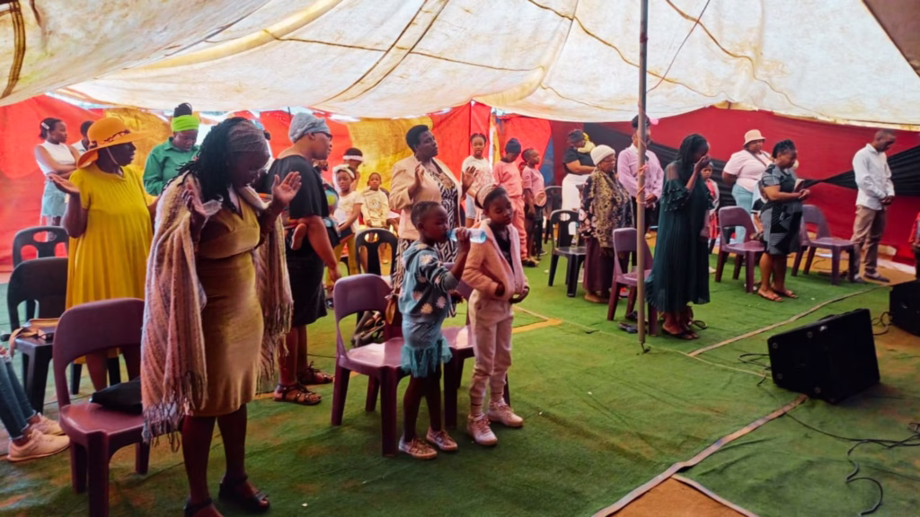 Divine Assembly International Ministries worship service in Kagiso Gauteng, teaching the Word of God and gathering believers in prayer and faith.